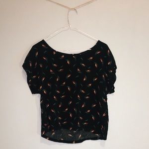 leaf-patterned shirt with zip in back